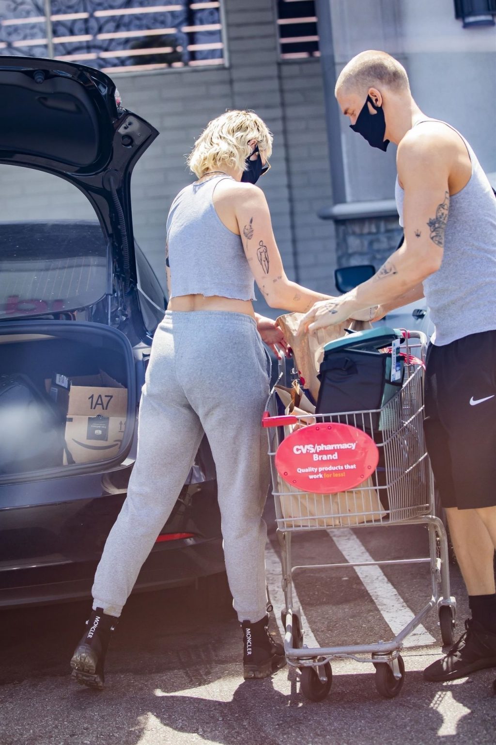 sport shopping photos Miley Cyrus Instagram celebrity braless bra 