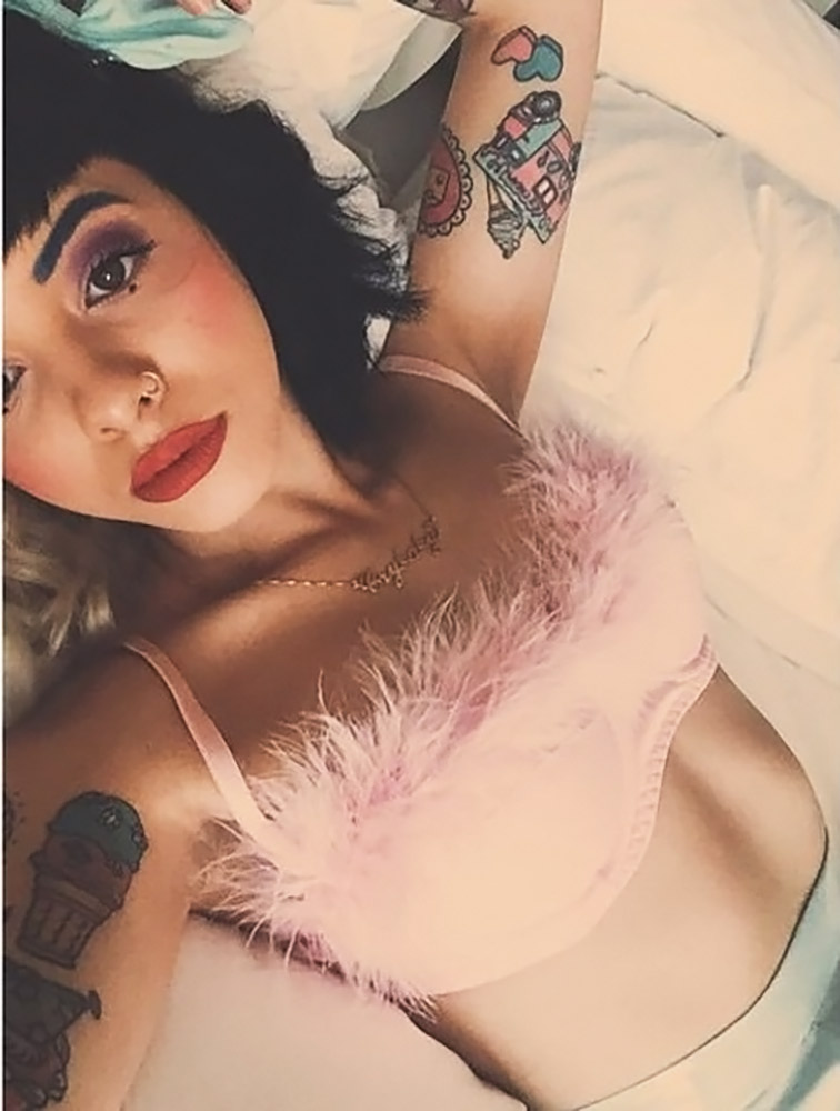 Melanie Martinez in bed