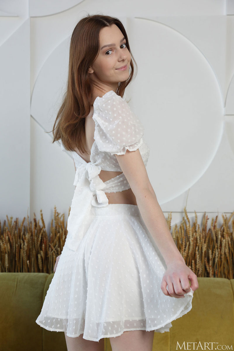 amber plume in a white skirt 2
